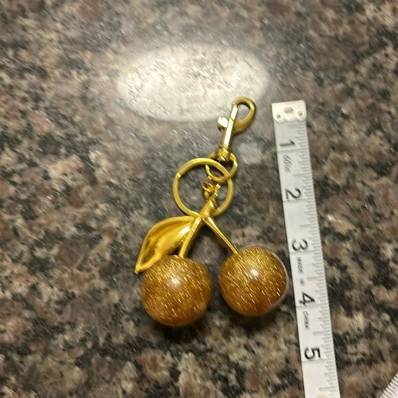 The Gabriella Gold and gold glitter cherry keychain for bag or keys - Picture 3 of 3